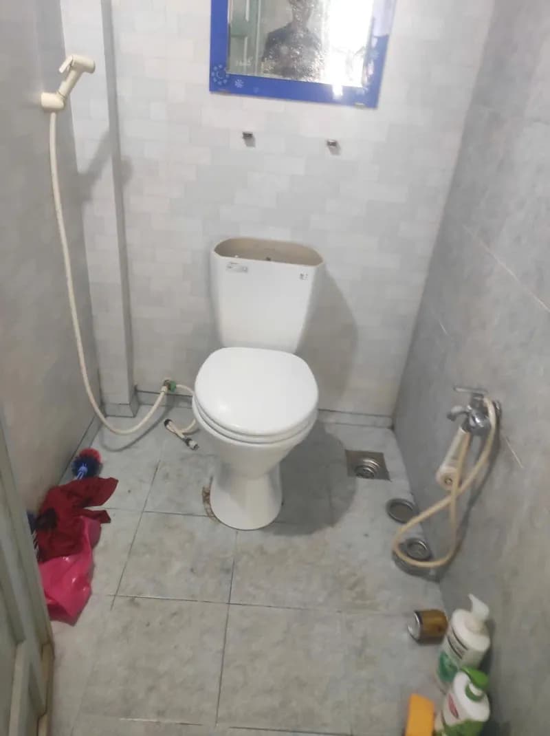 Sau khi hoàn thành sửa bồn cầu tại Tân Bình — thợ Bùi Văn An