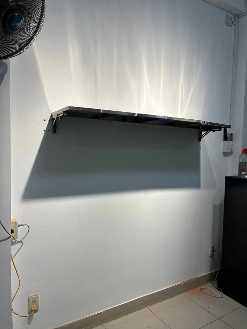 Sau khi hoàn thành sửa kệ inox treo tường tại phường 1, Tân Bình — thợ Dương Oai