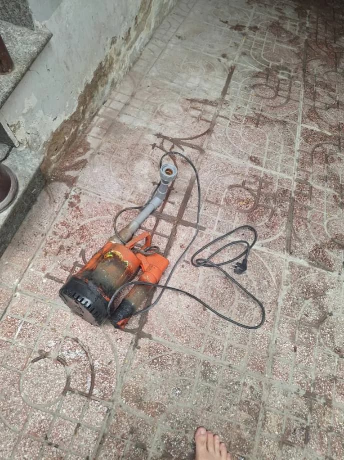 Trước sửa máy bơm chìm tại phường Tân Phong Quận 7, Quận 7 — thợ Trần Quốc Đông
