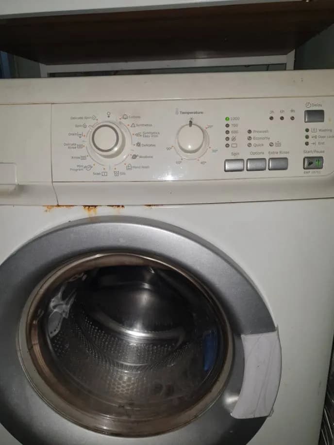Trước sửa máy giặt cửa trước Electrolux tại Quận 7 — thợ Lê Hữu Lộc