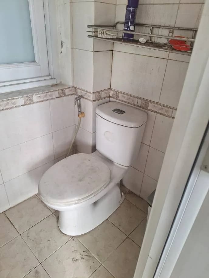 Sau khi hoàn thành sửa bồn cầu Inax tại Quận 7 — thợ Trần Quốc Đông