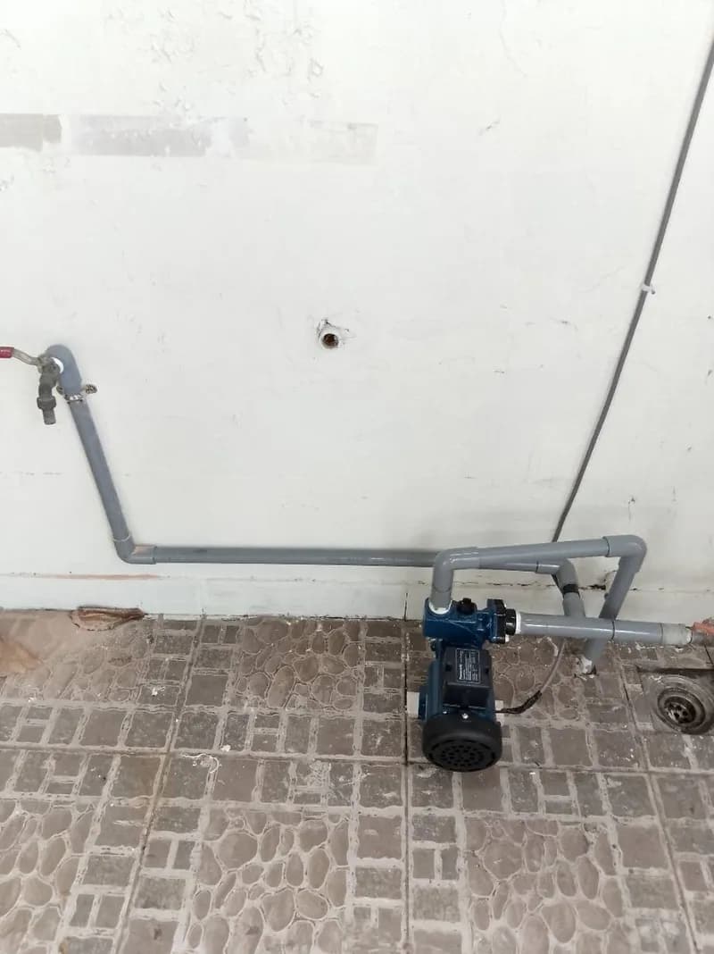 Sau khi hoàn thành sửa máy bơm tăng áp Panasonic tại Bình Tân — thợ Trương Công Việt Trân