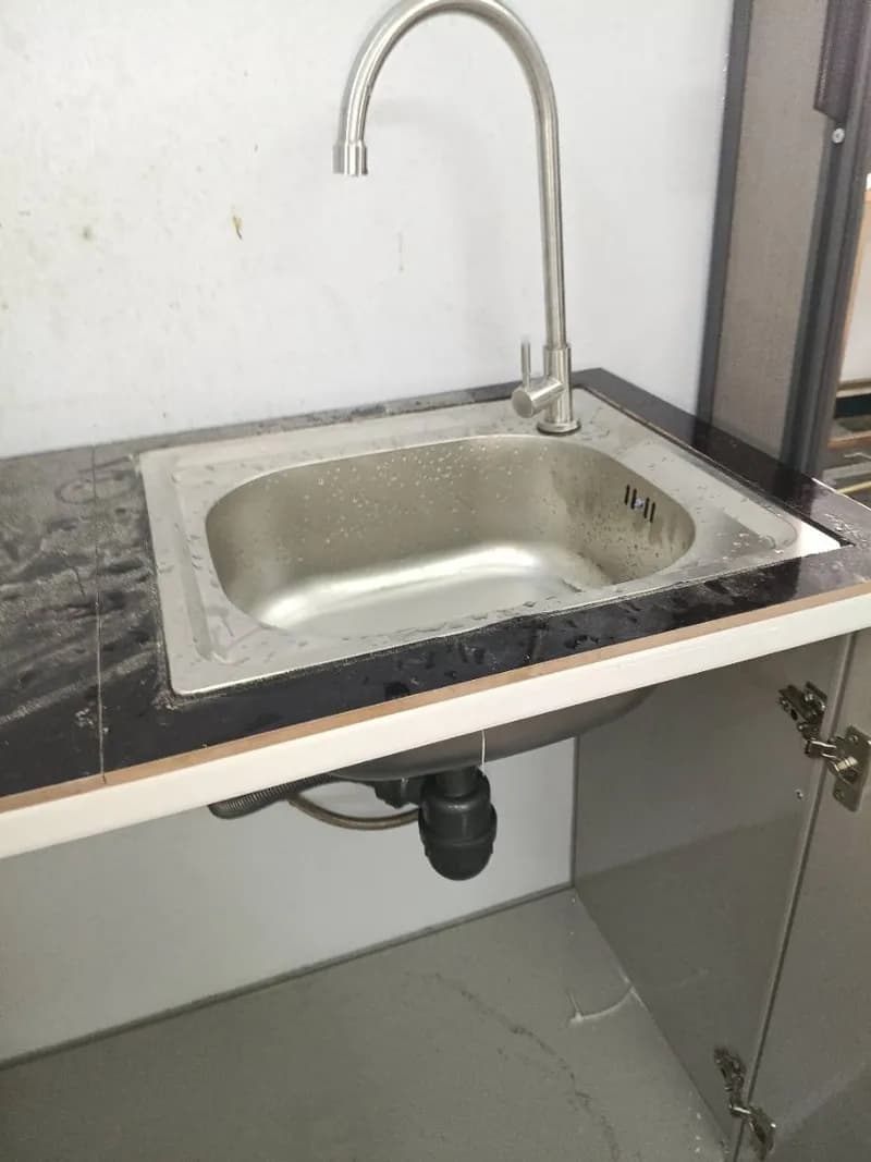 Sau khi hoàn thành sửa bồn rửa chén tại Quận 10 — thợ Trần Ngọc Tùng