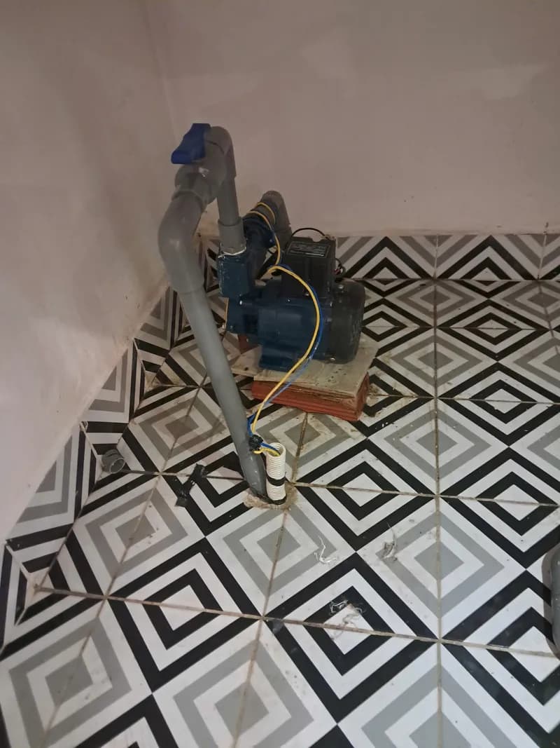 Trước sửa máy bơm tăng áp Panasonic tại Phường Chợ Quán, Quận 5 — thợ Bùi Văn An