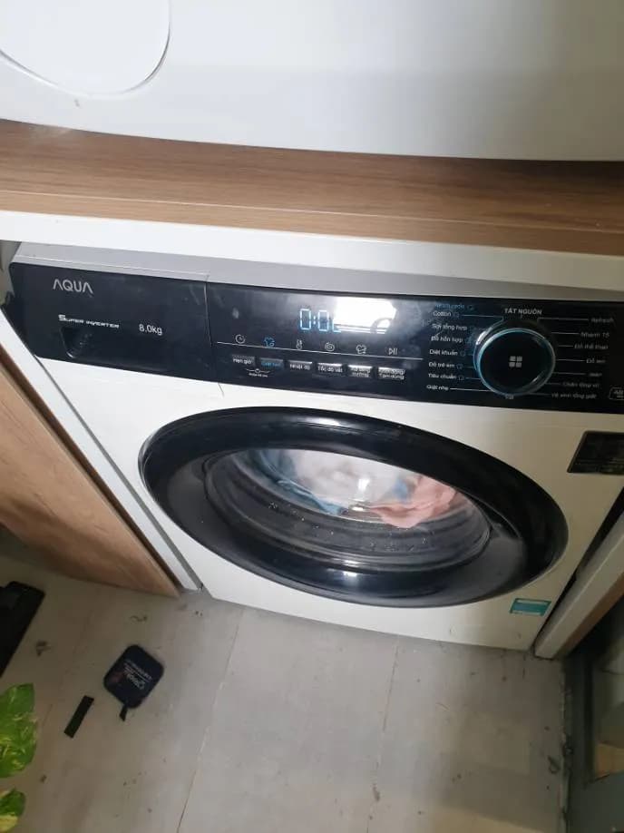 Trước sửa máy giặt cửa trước Aqua tại P.HCM, Thủ Đức — thợ Phan Chí Tâm