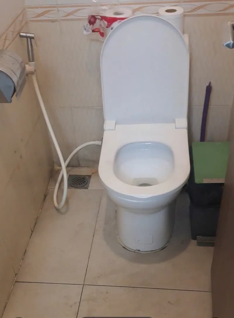 Sau khi hoàn thành sửa đường ống thoát nước sàn tại Quận 5 — thợ Bùi Văn An