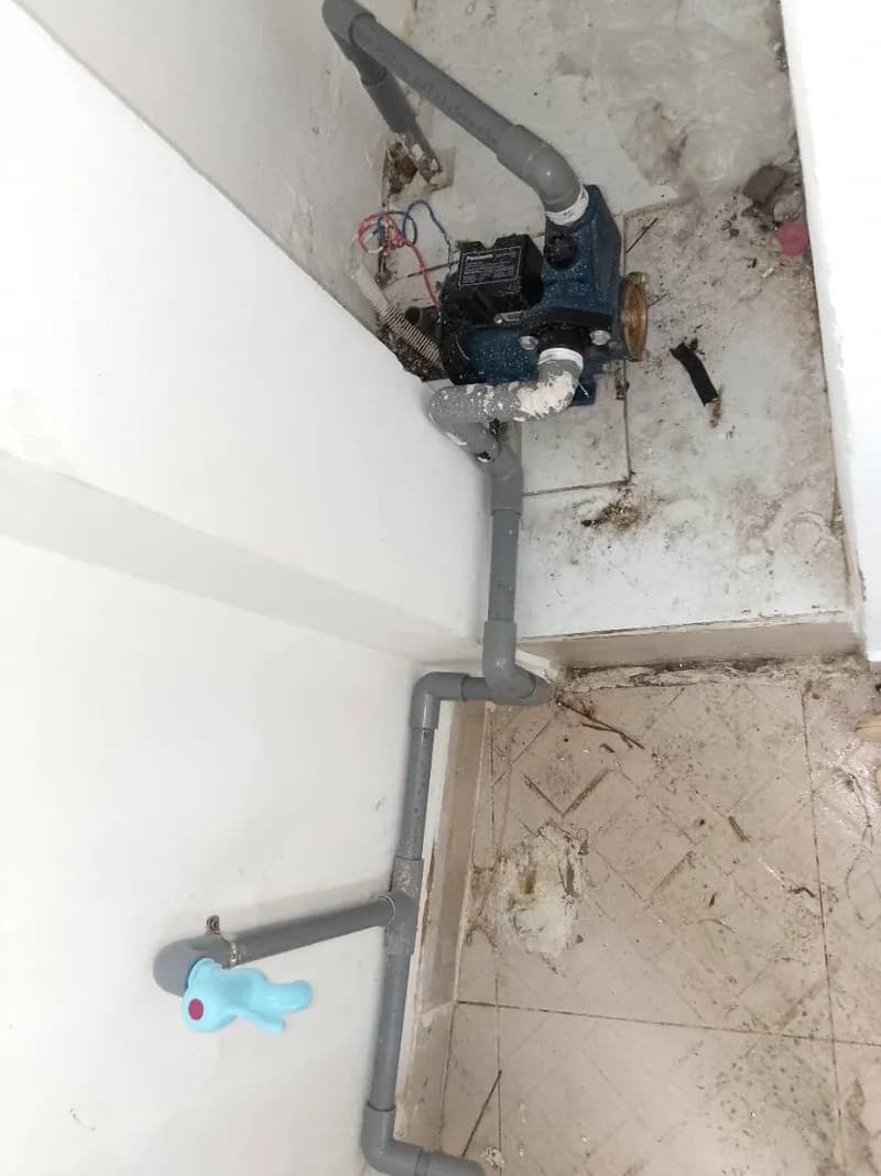 Sau khi hoàn thành sửa máy bơm nước Panasonic tại Bình Tân — thợ Trương Công Việt Trân