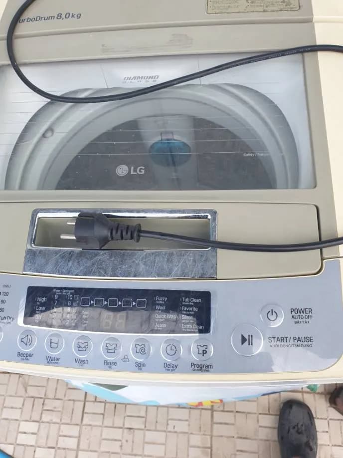 Trước sửa máy giặt cửa trên LG tại Quận 10 — thợ Phan Chí Tâm