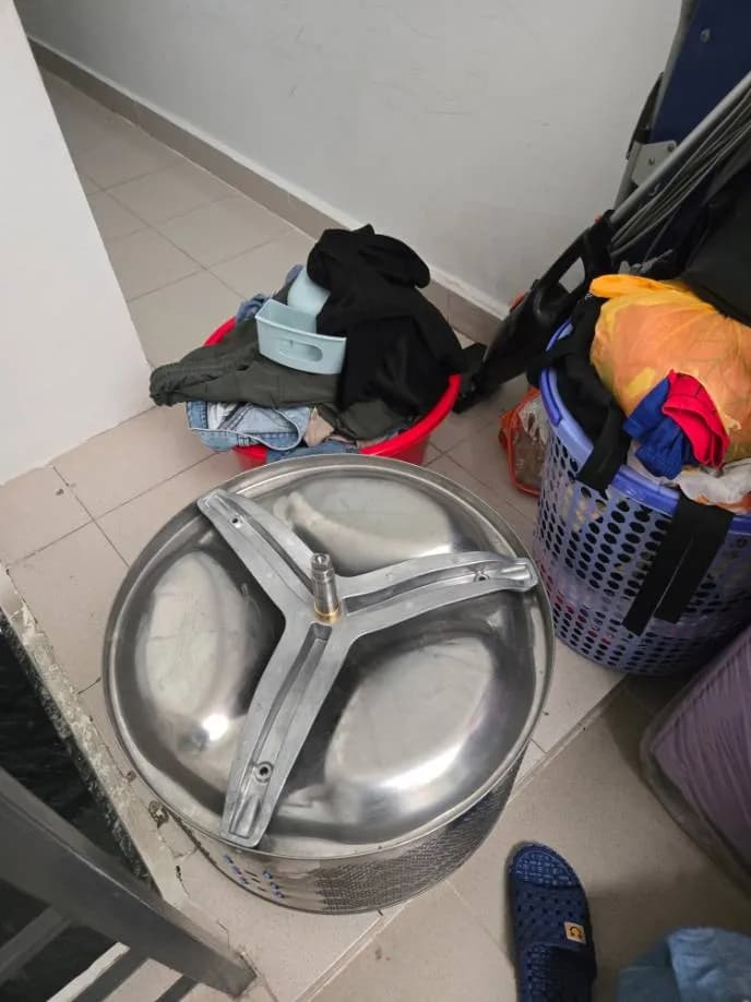 Sau khi hoàn thành sửa máy giặt tại Bình Thạnh — thợ Lê Hữu Lộc