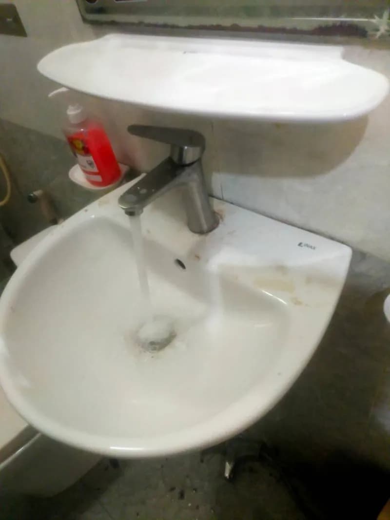 Sau khi hoàn thành sửa vòi lavabo Inax tại Bình Thạnh — thợ Lê Đăng Tuấn