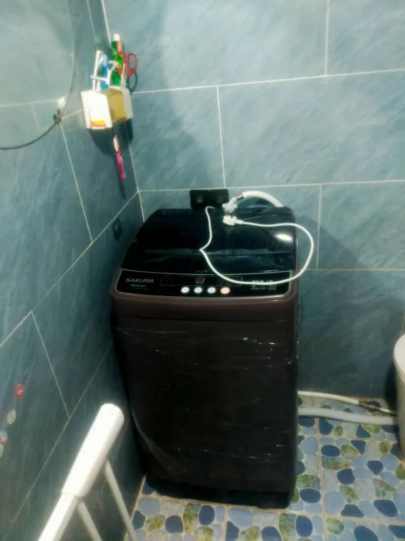 Sau khi hoàn thành sửa máy giặt cửa trên SAKURA tại Bình Thạnh — thợ Lê Đăng Tuấn
