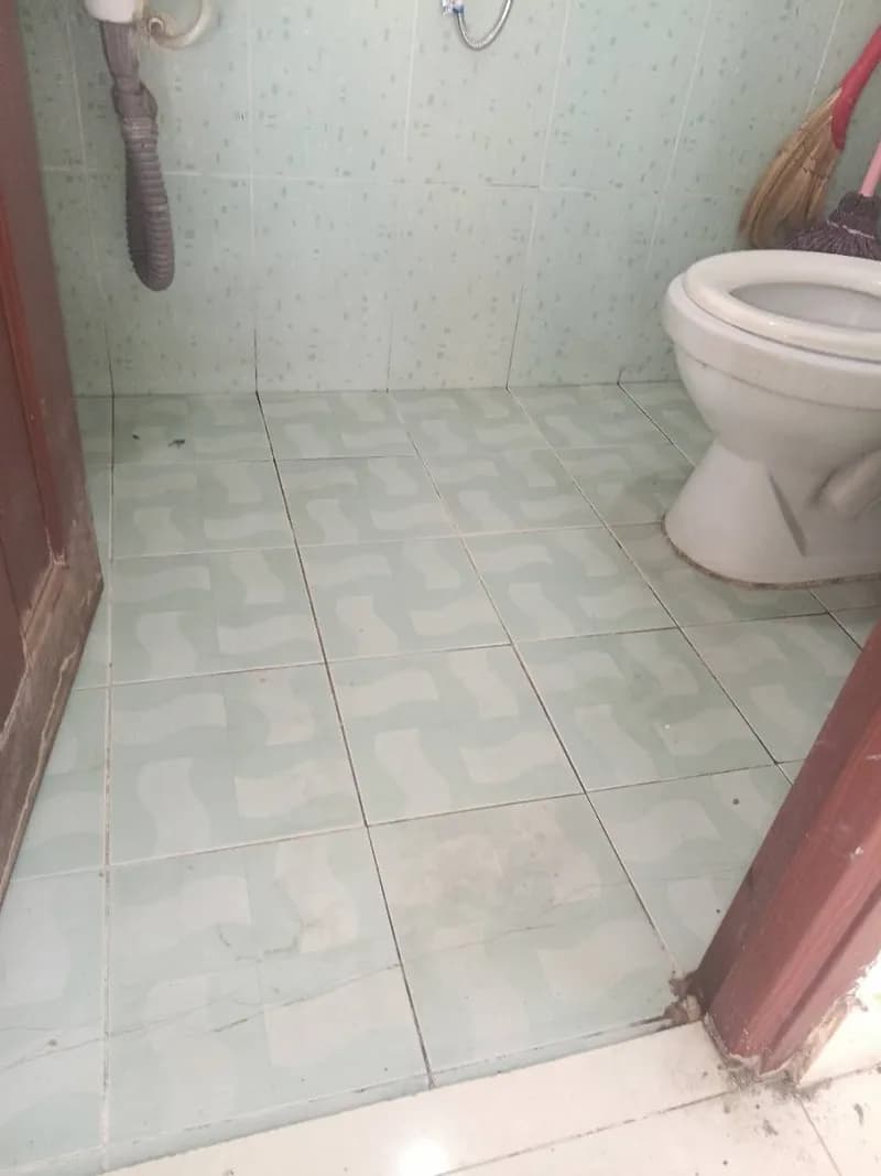 Trước sửa bồn cầu tại Phường 11, Tân Bình — thợ Trần Ngọc Tùng
