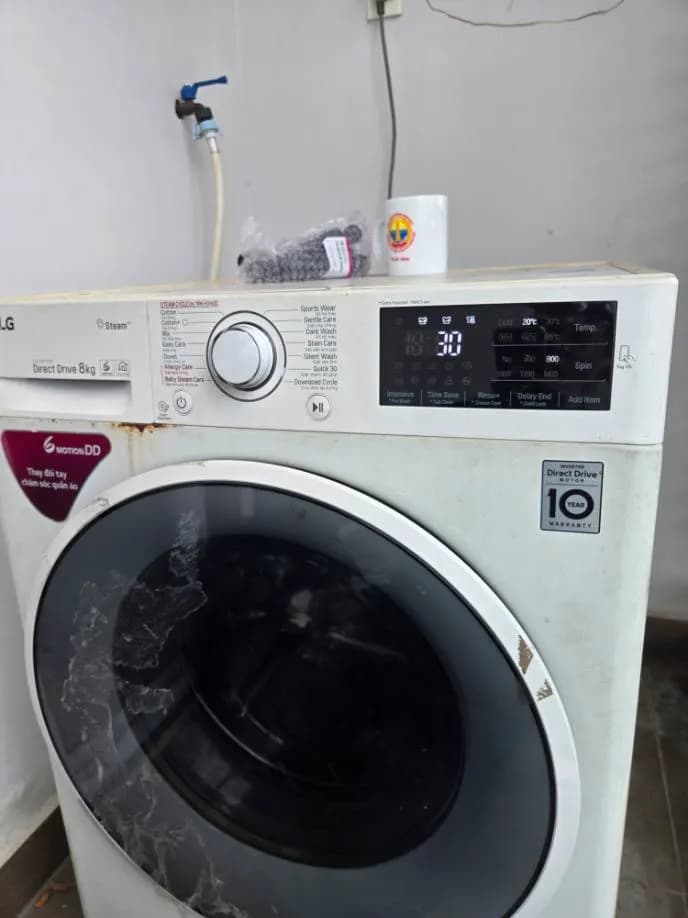 Sau khi hoàn thành sửa máy giặt cửa trước LG tại Quận 6 — thợ Lê Hữu Lộc