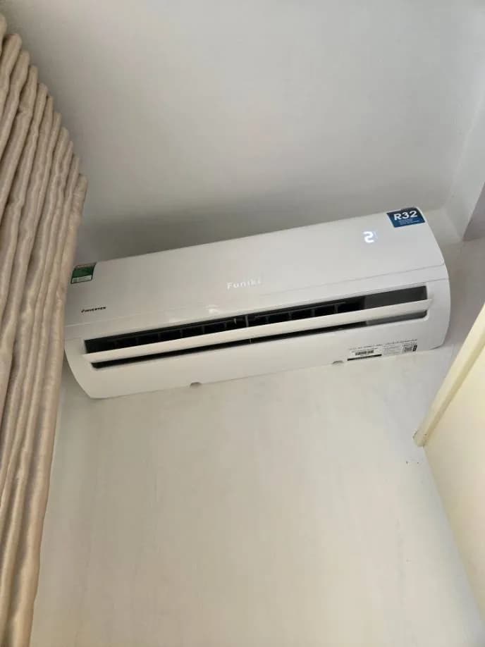 Sau khi hoàn thành sửa máy lạnh treo tường Funiki tại Phú Nhuận — thợ Lê Hữu Lộc