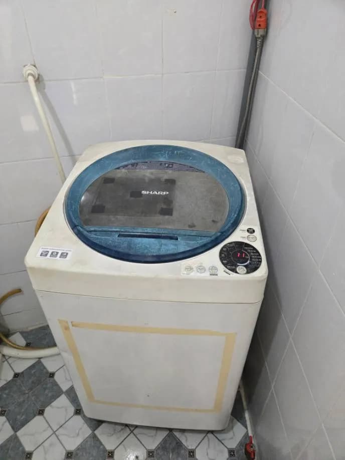 Thay động cơ xả máy giặt Sharp tại quận Bình Thạnh tại Bình Thạnh
