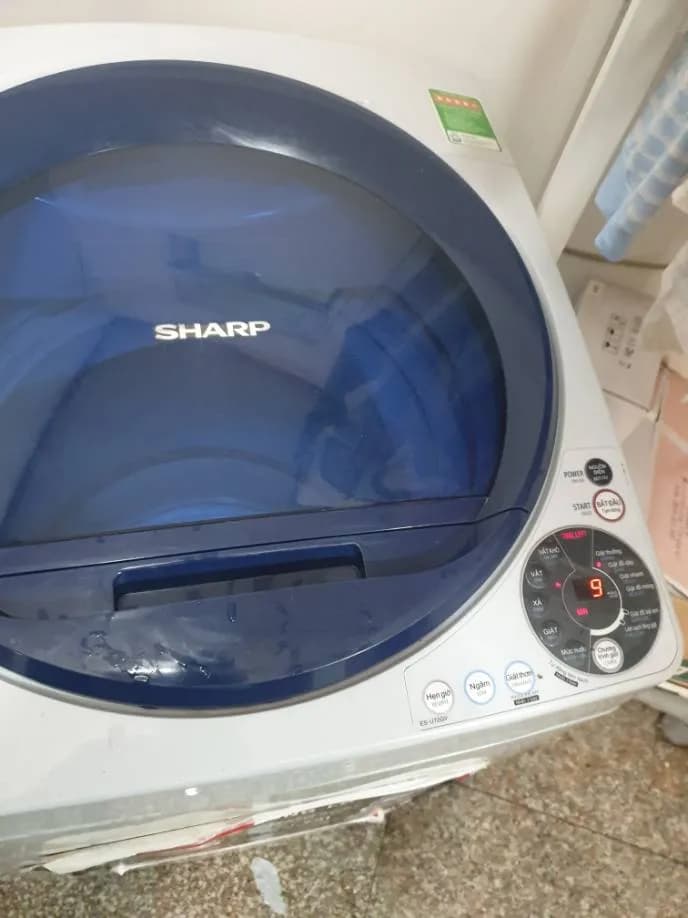 Sau khi hoàn thành sửa máy giặt cửa trên Sharp tại phường Tân Hưng, Quận 7 — thợ Phan Chí Tâm