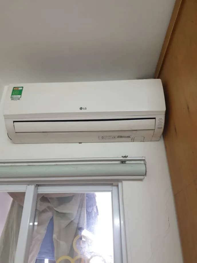 Trước sửa máy lạnh treo tường LG tại Phường Tân Thuận Đông, Quận 7 — thợ Phan Chí Tâm