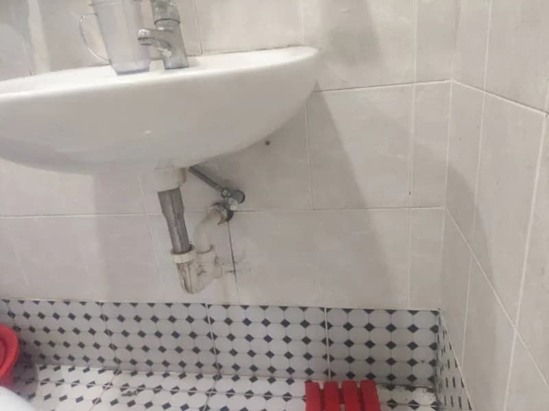 Sau khi hoàn thành sửa vòi rửa chén và bộ xả lavabo tại Nhà Bè — thợ Nguyễn Hoàng Khánh