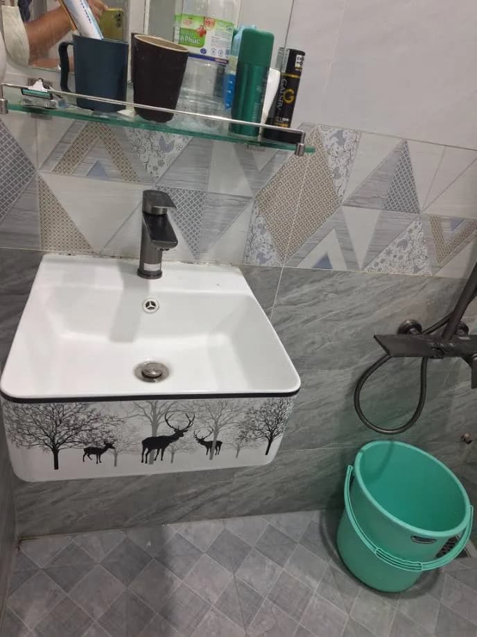Sau khi hoàn thành sửa lavabo tại Quận 4 — thợ Trần Quốc Đông