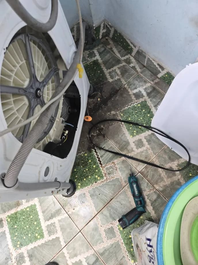 Trước sửa máy giặt cửa trước tại Tân Phú — thợ Lê Hữu Lộc