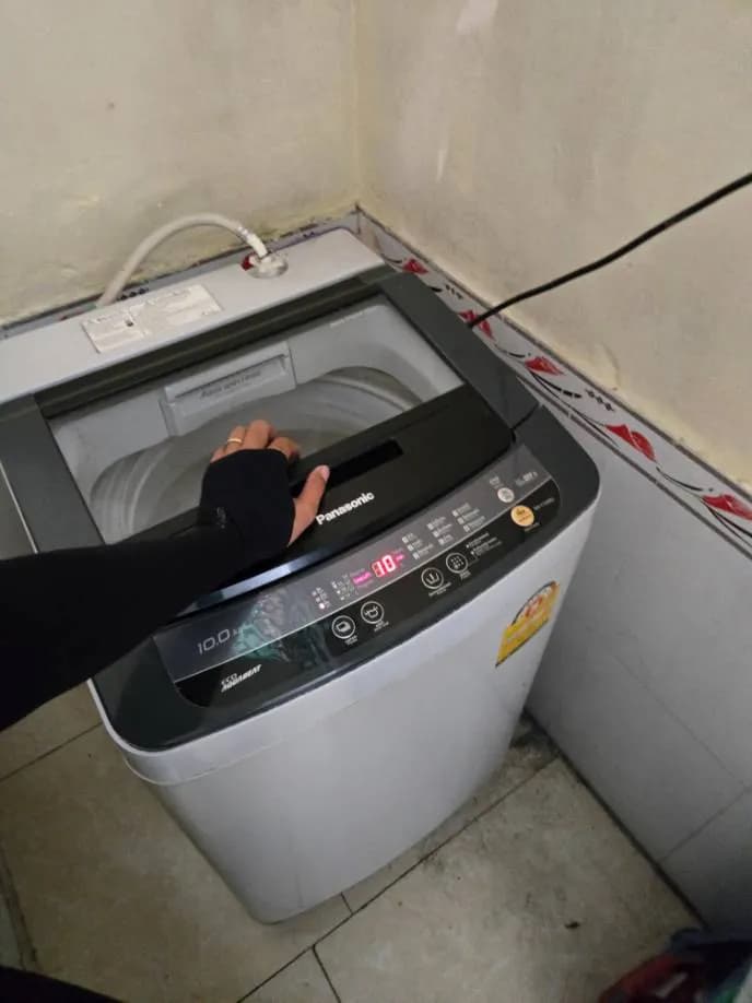 Trước sửa máy giặt cửa trên Panasonic tại Phường 15, Tân Bình — thợ Lê Hữu Lộc