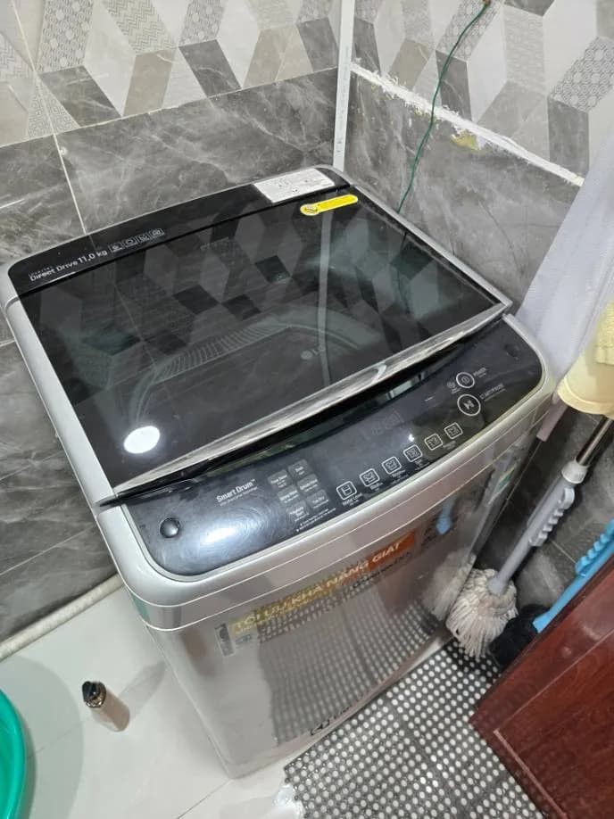 Trước sửa máy giặt cửa trên LG tại Phường 7, Tân Bình — thợ Lê Hữu Lộc