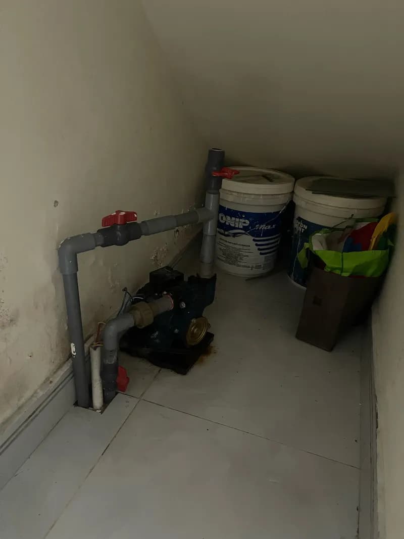 Sau khi hoàn thành sửa máy bơm nước tại Quận 10 — thợ Nguyễn Quốc Bảo