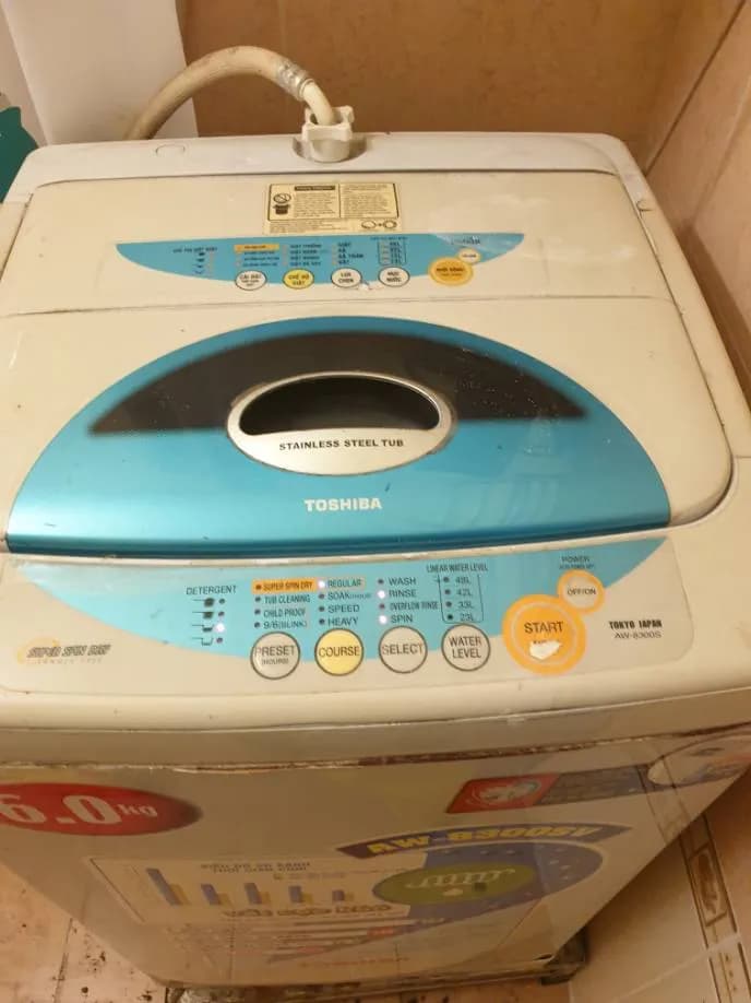 Sau khi hoàn thành sửa máy giặt cửa trên Toshiba tại P.HCM, Tân Bình — thợ Phan Chí Tâm