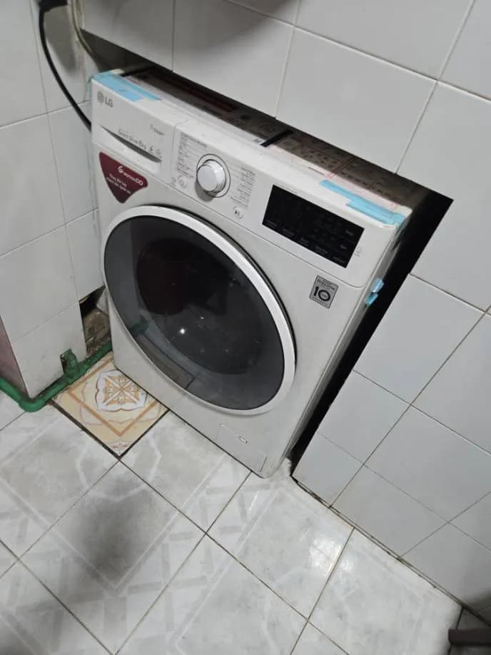 Sau khi hoàn thành sửa máy giặt cửa trước LG tại Tân Bình — thợ Lê Hữu Lộc