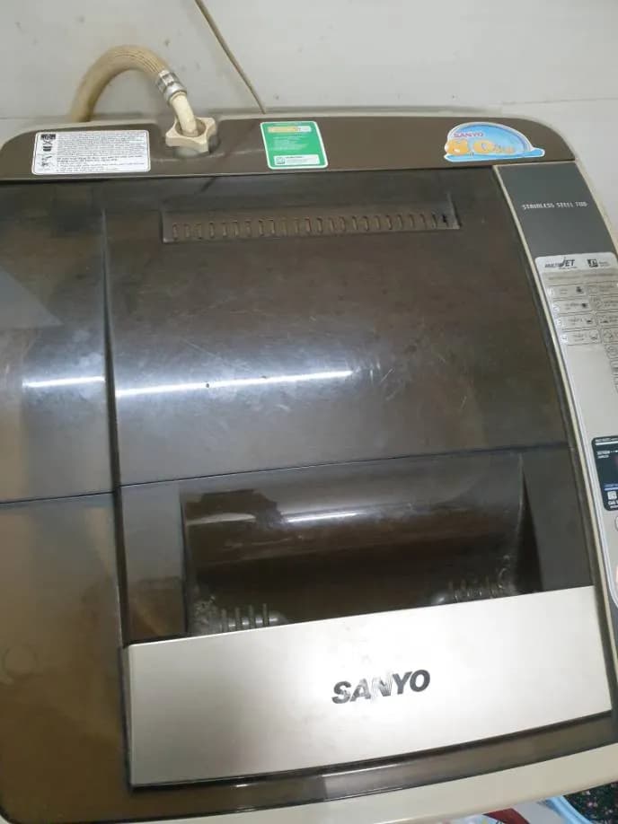 Sau khi hoàn thành sửa máy giặt cửa trên Sanyo tại Quận 7 — thợ Phan Chí Tâm