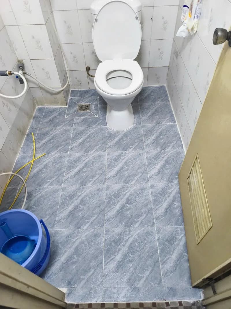 Sau khi hoàn thành sửa nền nhà vệ sinh tại Phú Nhuận — thợ Bùi Văn An