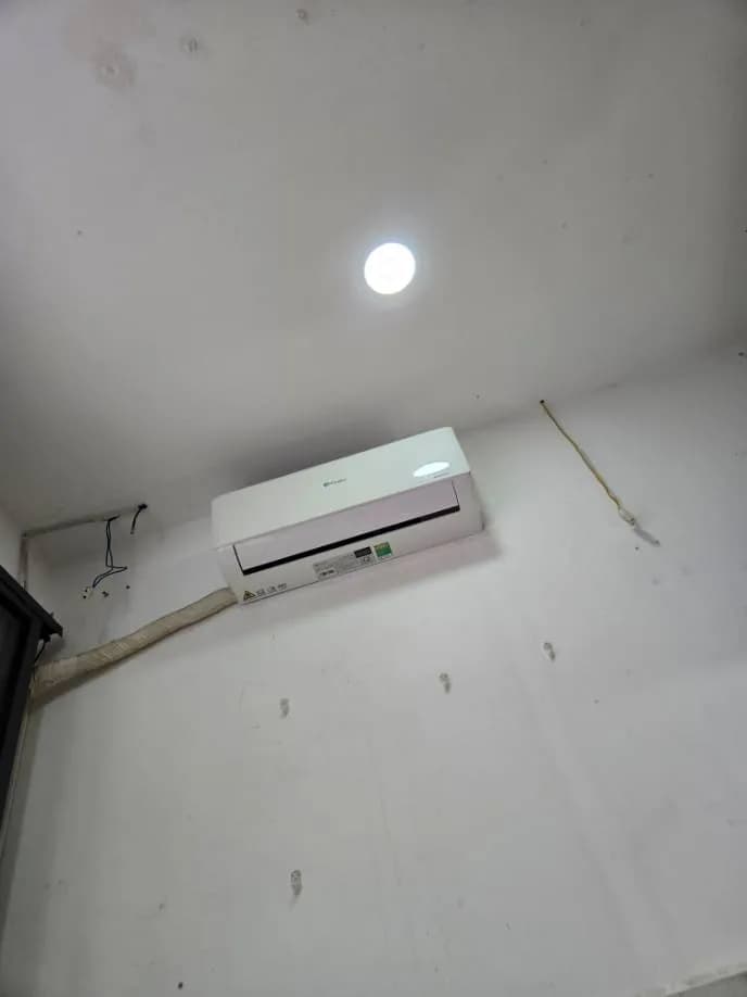 Sau khi hoàn thành sửa máy lạnh treo tường Casper tại Tân Bình — thợ Lê Hữu Lộc