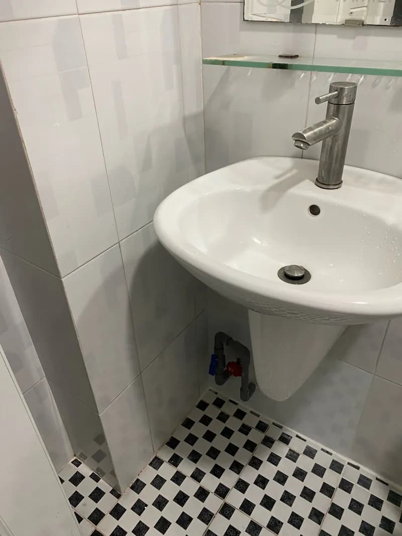 Sau khi hoàn thành sửa lavabo tại Thủ Đức — thợ Bùi Văn An