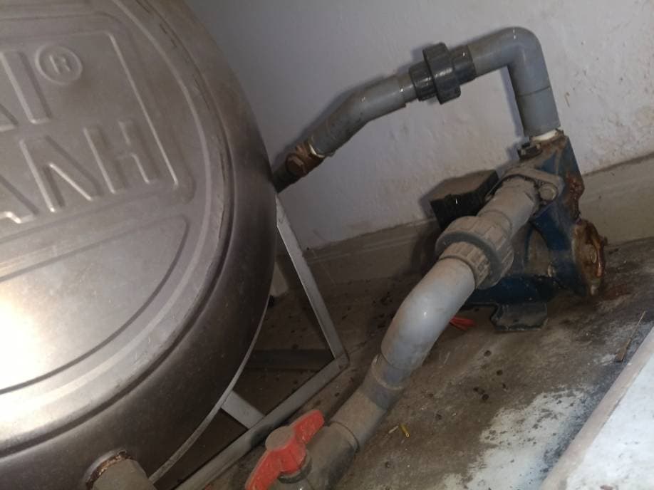 Sau khi hoàn thành sửa máy bơm nước Kawasan tại TPHCM — thợ Trần Ngọc Tùng