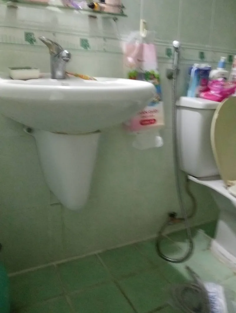 Đường ống lavabo rò rỉ trước khi sửa tại Gò Vấp