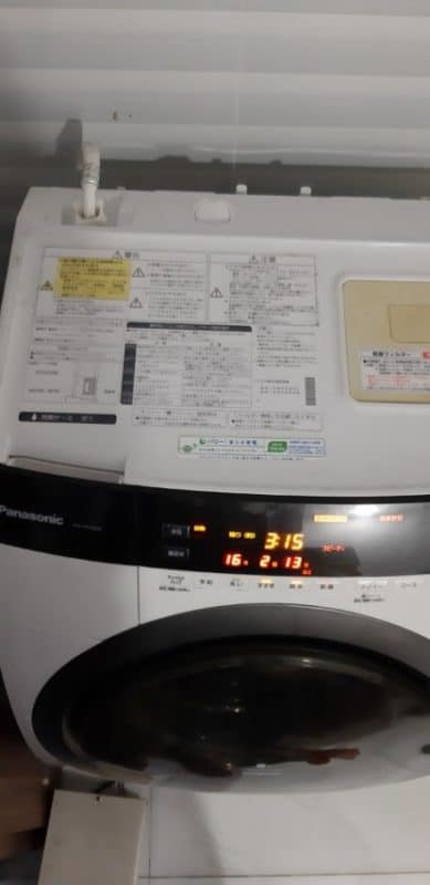 Tháo máy giặt sấy nội địa 11 kg tại Quận Tân Bình 2