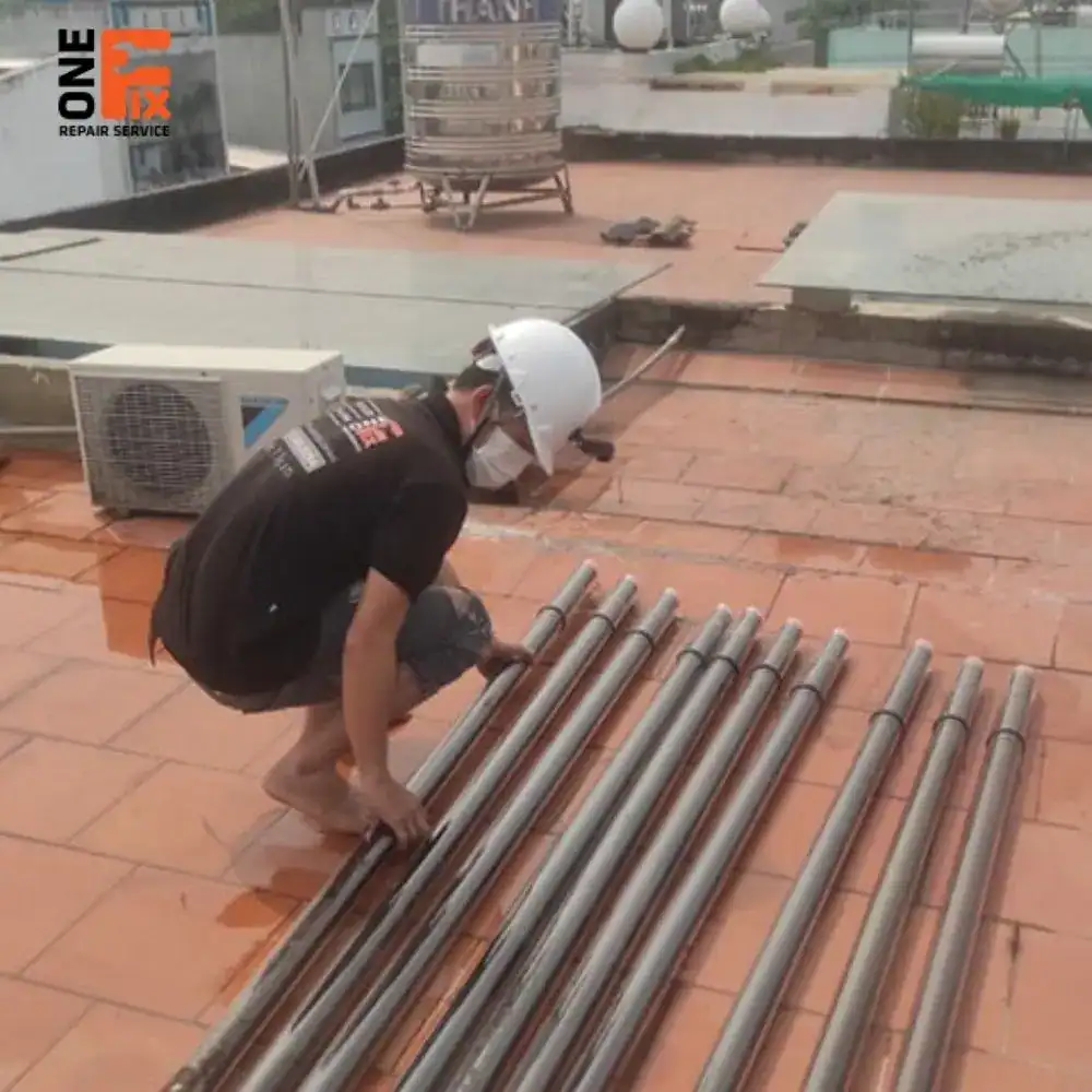 Dịch vụ sửa máy nước nóng năng lượng mặt trời 6 Thay ống chân không