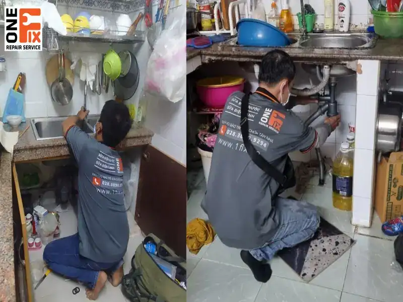 Thợ của 1FIX đang dùng đồ nghề chuyên dụng để kiểm tra và sửa vòi nước rửa chén cho khách.